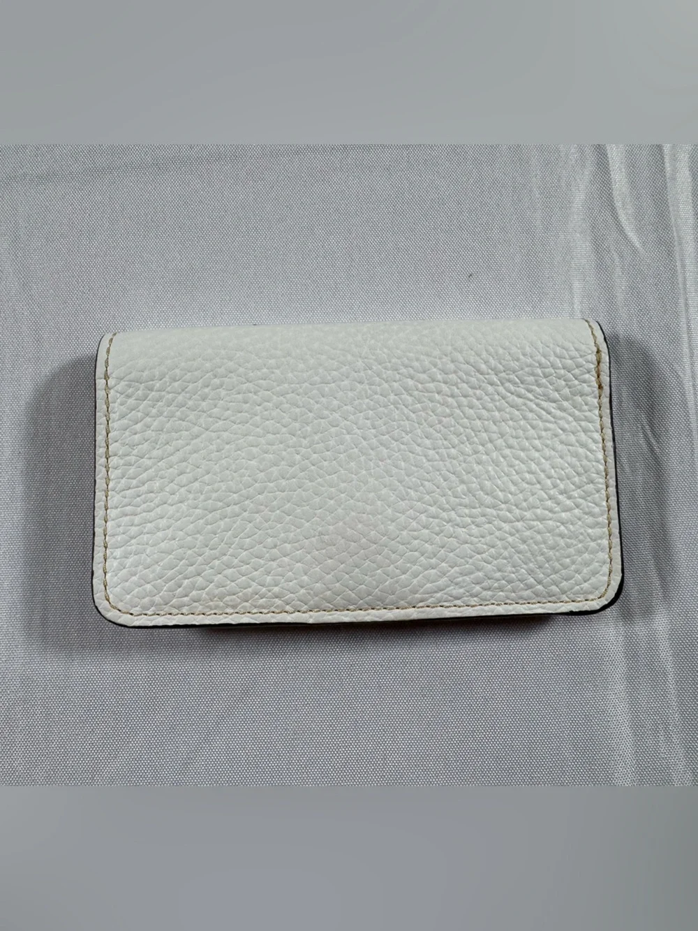 Dooney & Bourke White Pebbled Leather Wallet with Tan Trim